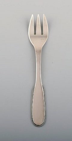 Seven Evald Nielsen Number 14 Cake Forks in Hammered Silver, 1920s