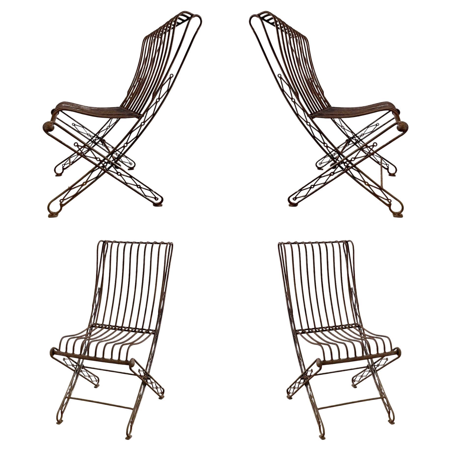 Siete sillas plegables de forja francesa  en venta 11