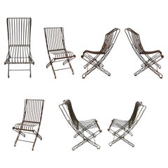Seven French Fer Forge Folding Chairs