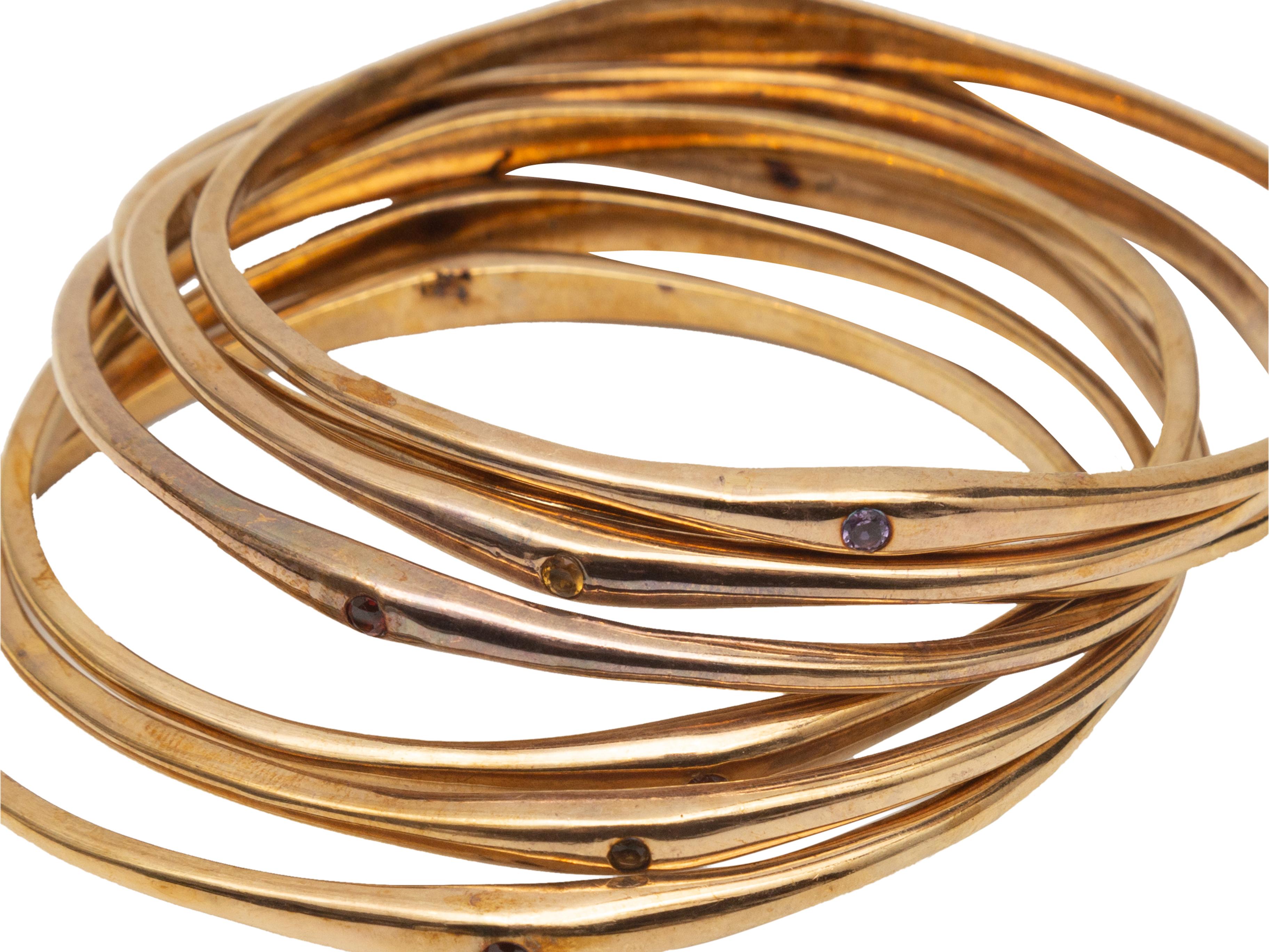 Product Details: Gold plated thin bangle bracelets with multicolor stones. Group of seven. 3