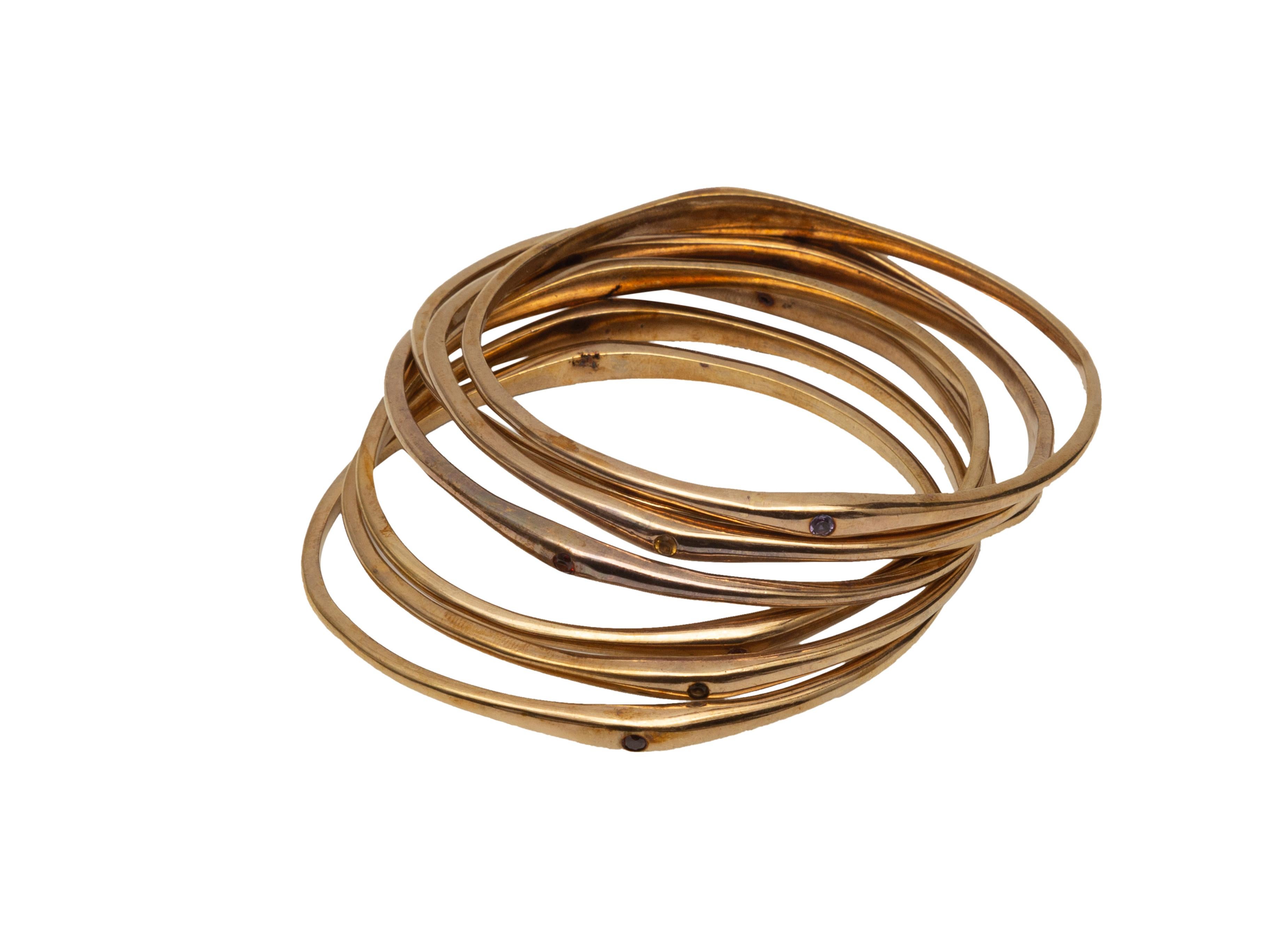 Seven Gold Plated Thin Bangle Bracelets In Good Condition In New York, NY