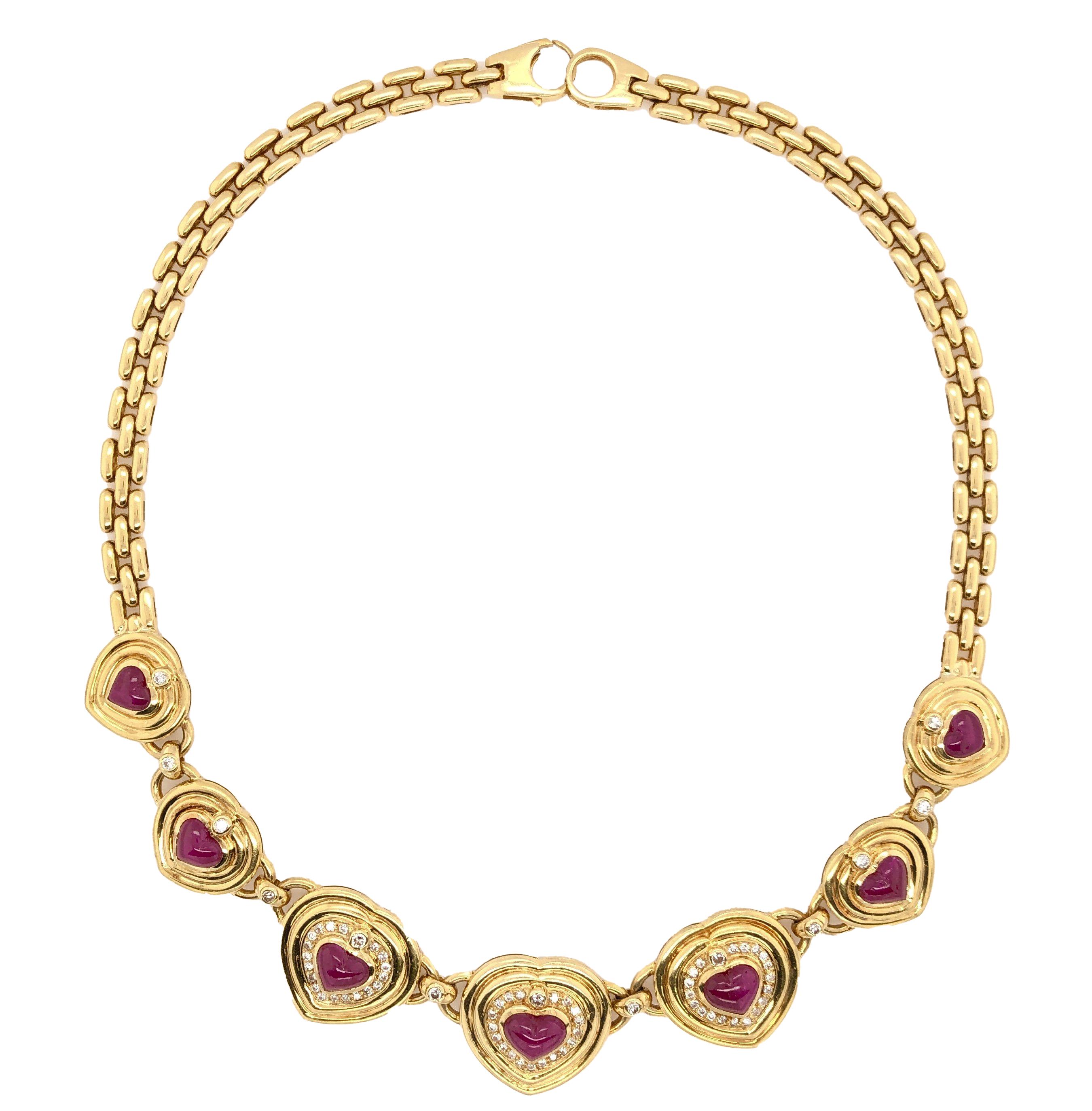 This one-of-a-kind vintage necklace is composed of seven large heart-shaped cabochon rubies, possessing a stunningly fine and vibrant red color, referred to as 'pigeon blood red', which amount to a total carat weight of 15. The single row of