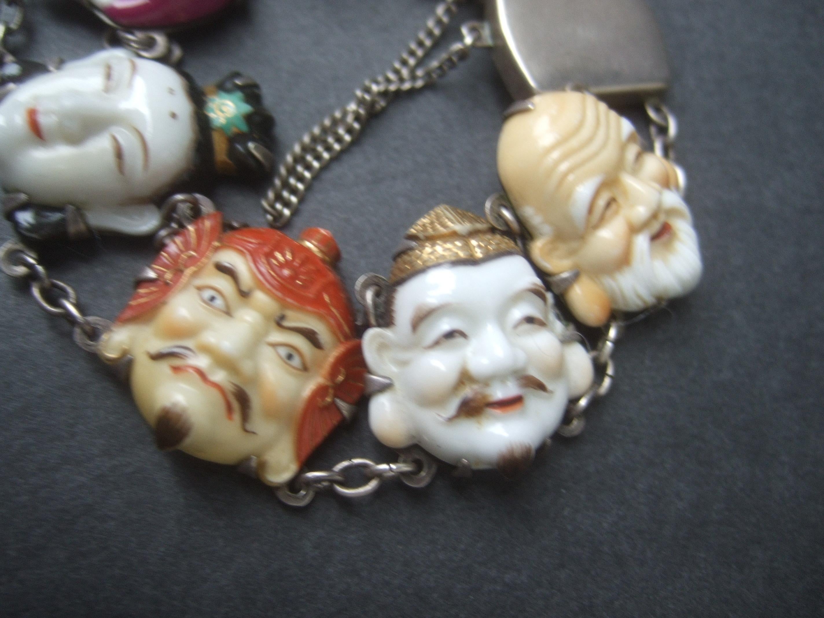 Seven Immortal Lucky Gods of Japan Sterling & Porcelain Figural Bracelet c 1950s For Sale 3