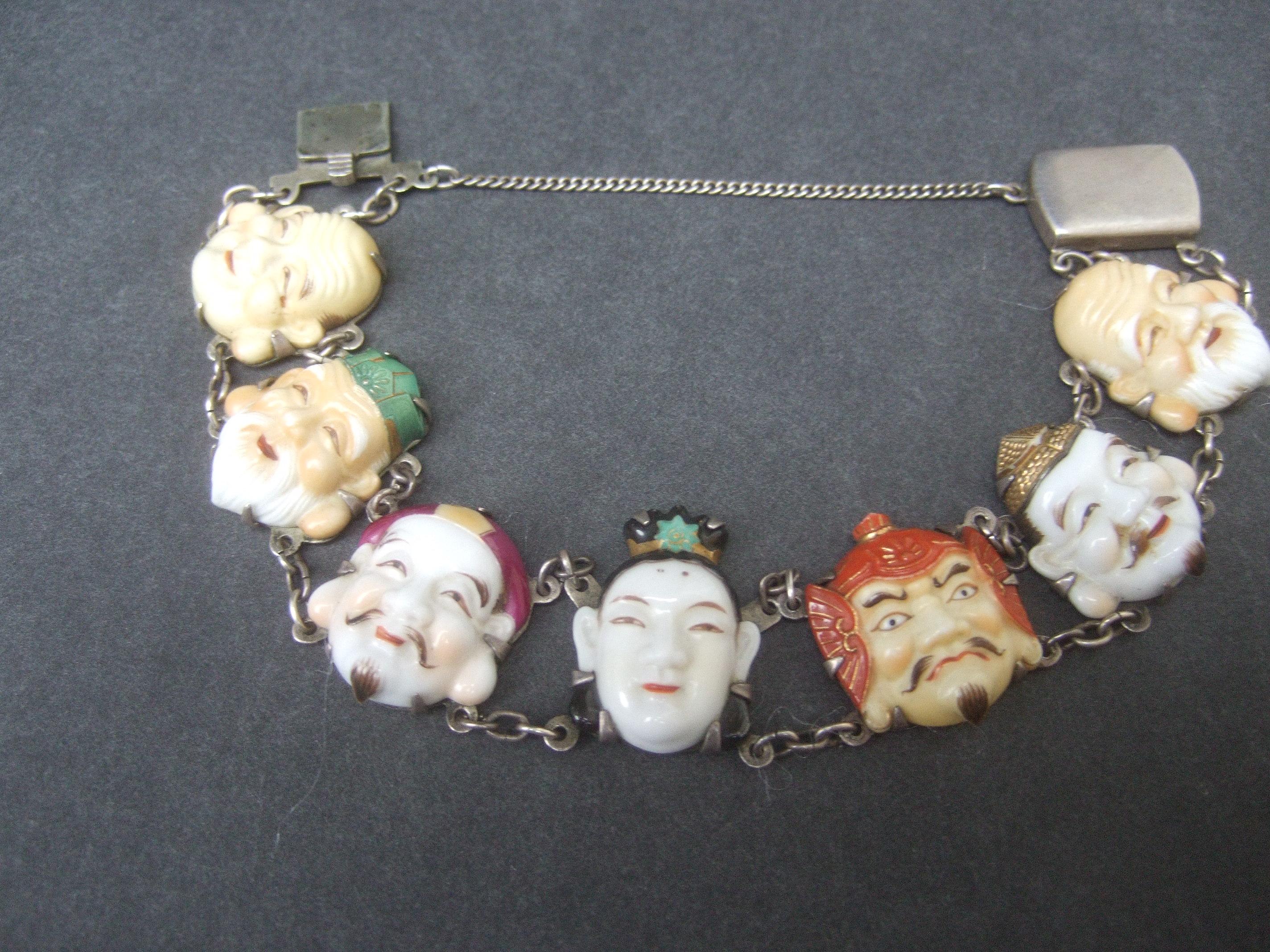 Seven Immortal Lucky Gods of Japan Sterling & Porcelain Figural Bracelet c 1950s Bon état - En vente à University City, MO