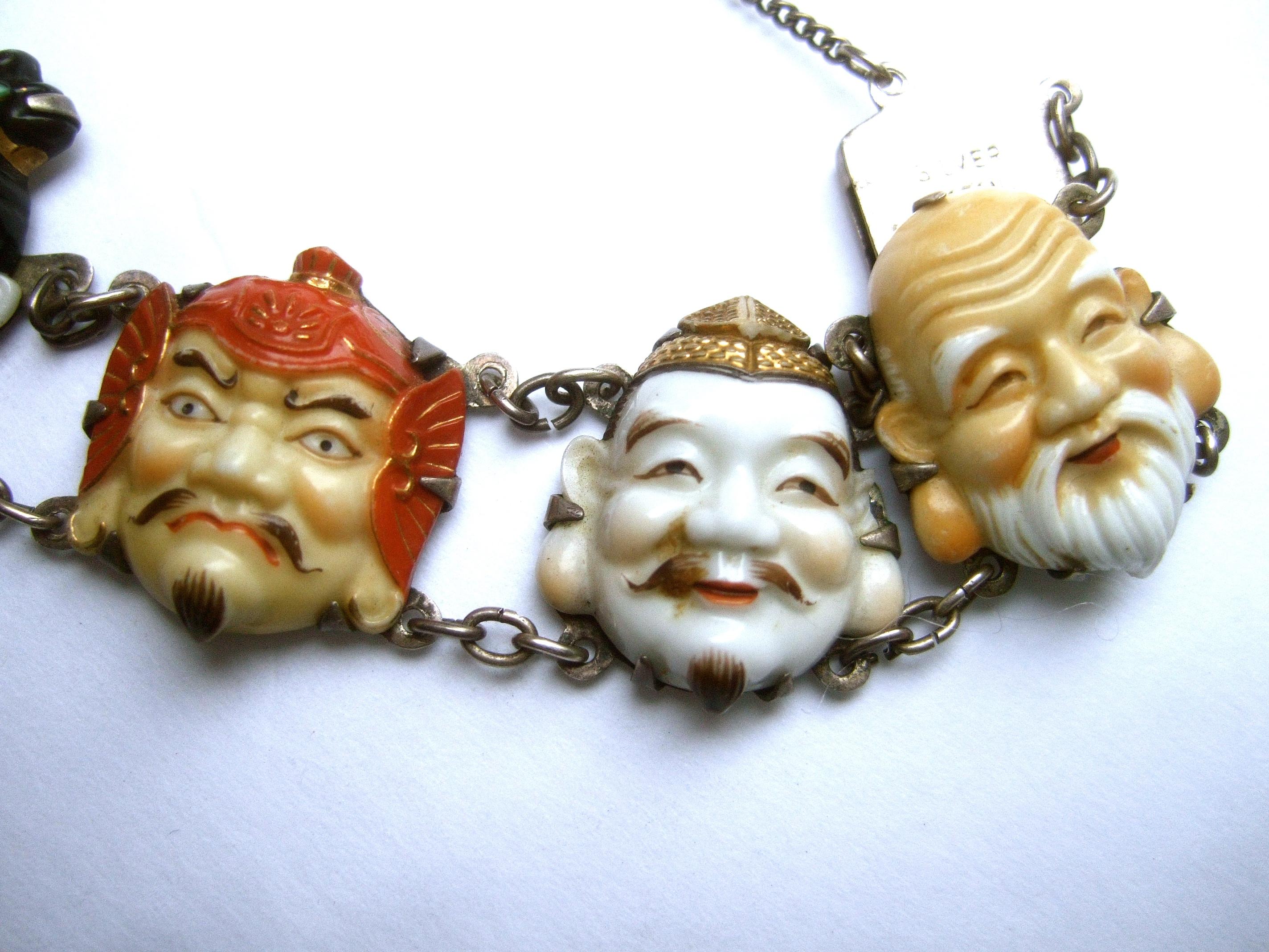 Seven Immortal Lucky Gods of Japan Sterling & Porcelain Figural Bracelet c 1950s Pour femmes en vente