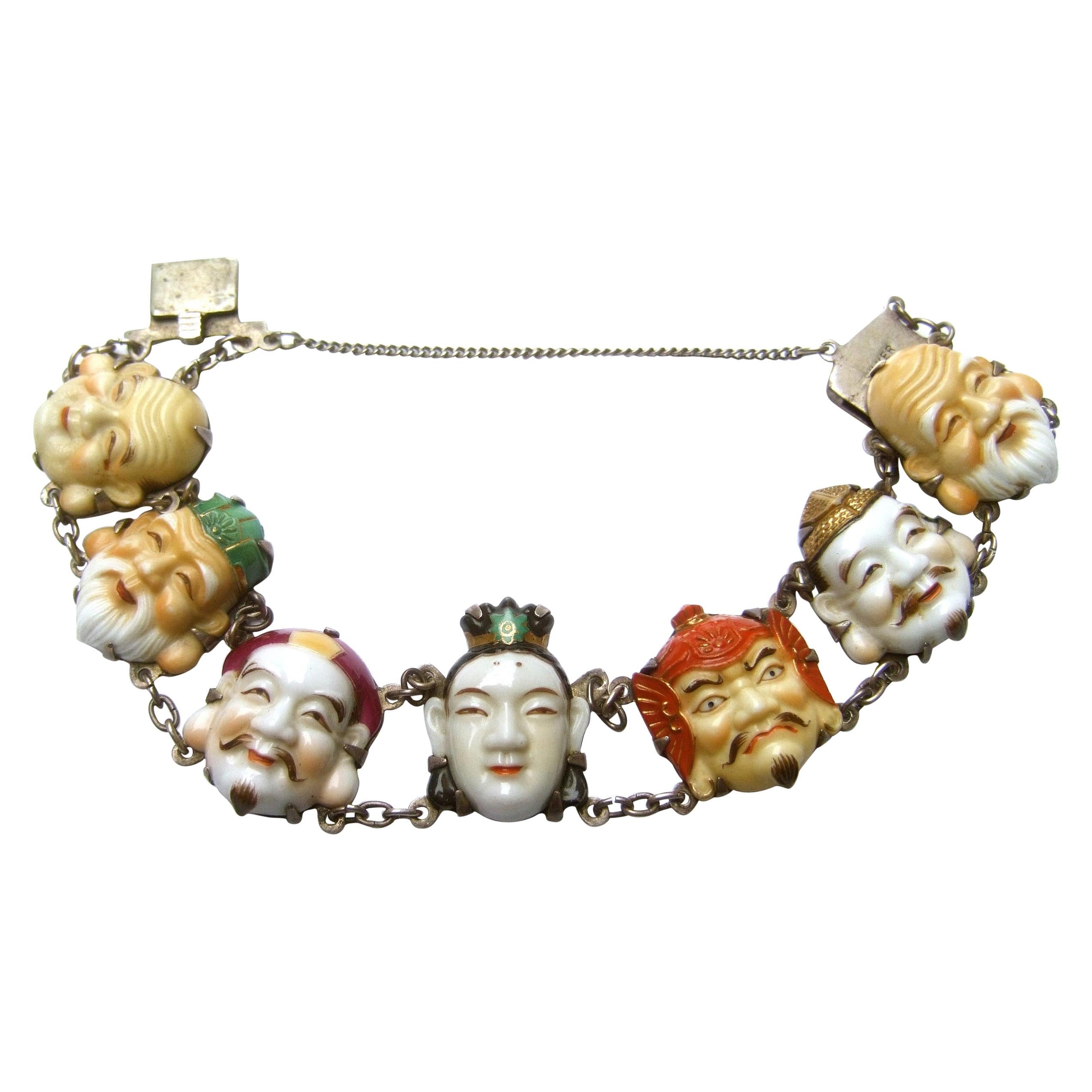Seven Immortal Lucky Gods of Japan Sterling & Porcelain Figural Bracelet c 1950s