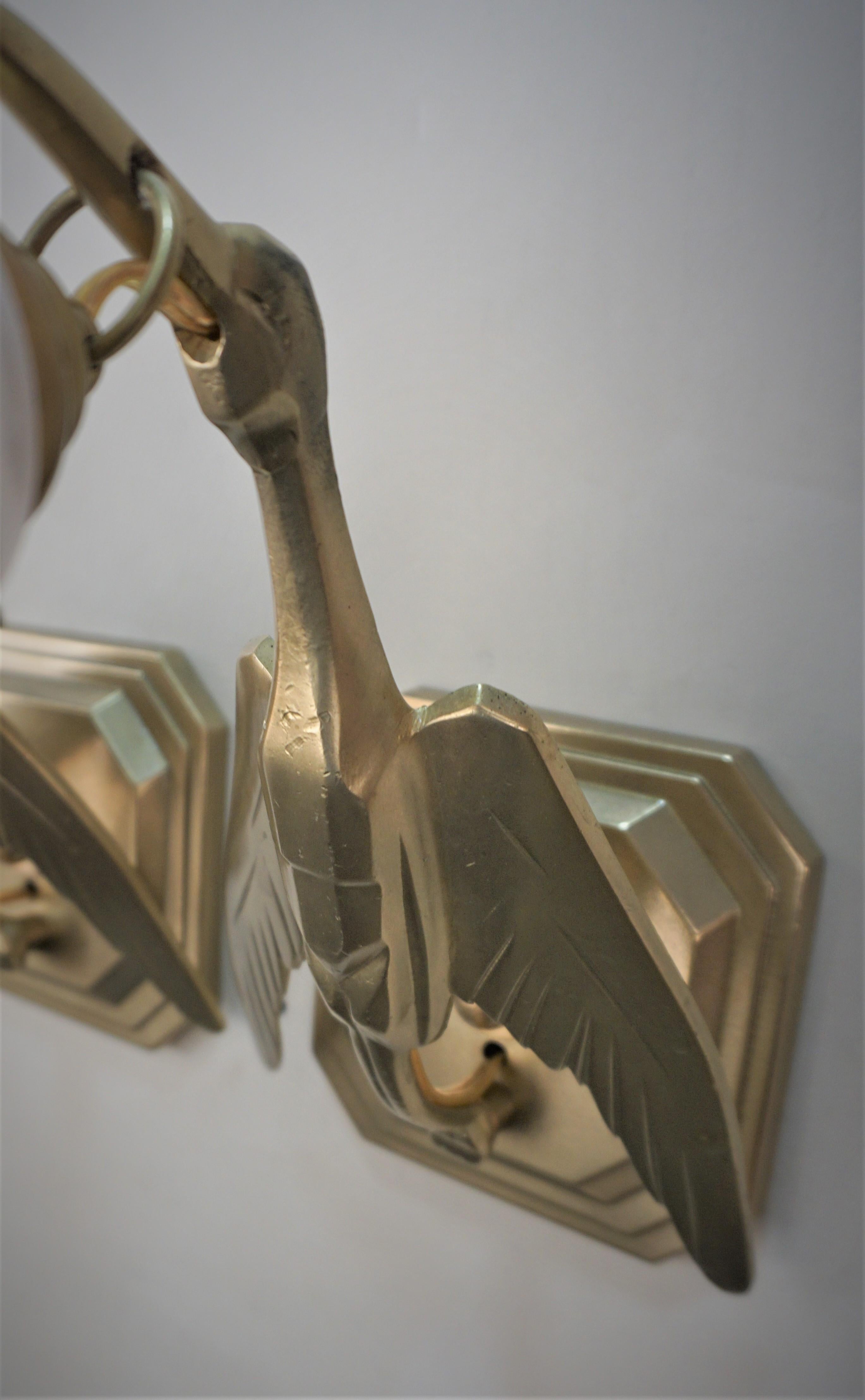 Seven Pairs of Art Deco Bronze and Glass Flying Bird Wall Sconce by Degue For Sale 3