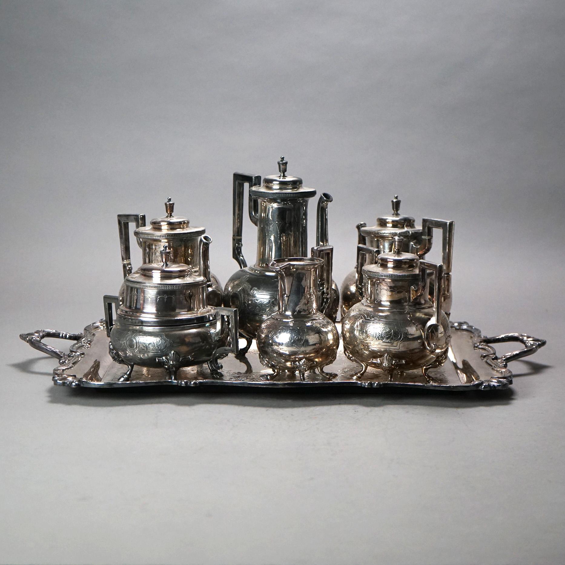 Seven Piece Antique Silver Plated Figural Deerfoot Tea Set with Foliate Engraving C1890

Measures 10.5