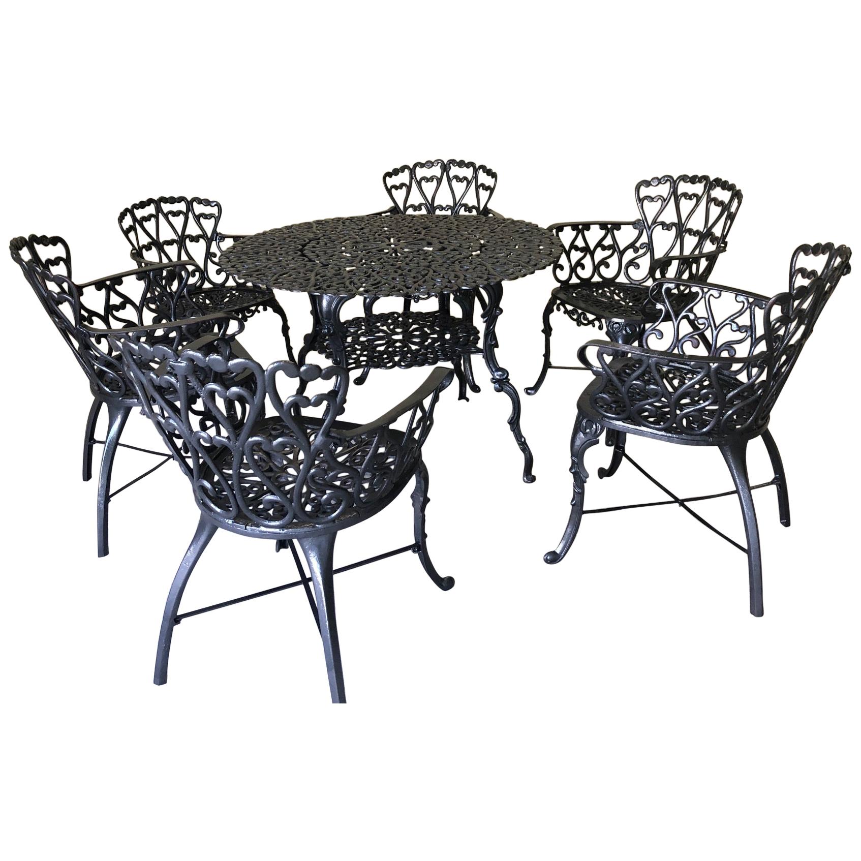 Seven Piece Black Patio Dining Set at 1stDibs