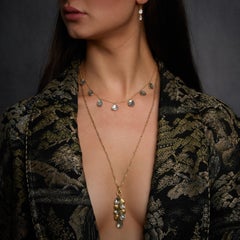 Seven Polki Diamonds Set In 18kt Gold And Hanging Along An 17" Chain