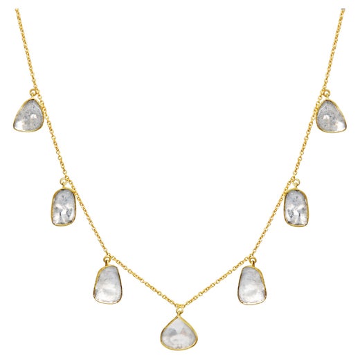 Seven Polki Diamonds Set In 18kt Gold And Hanging Along An 17