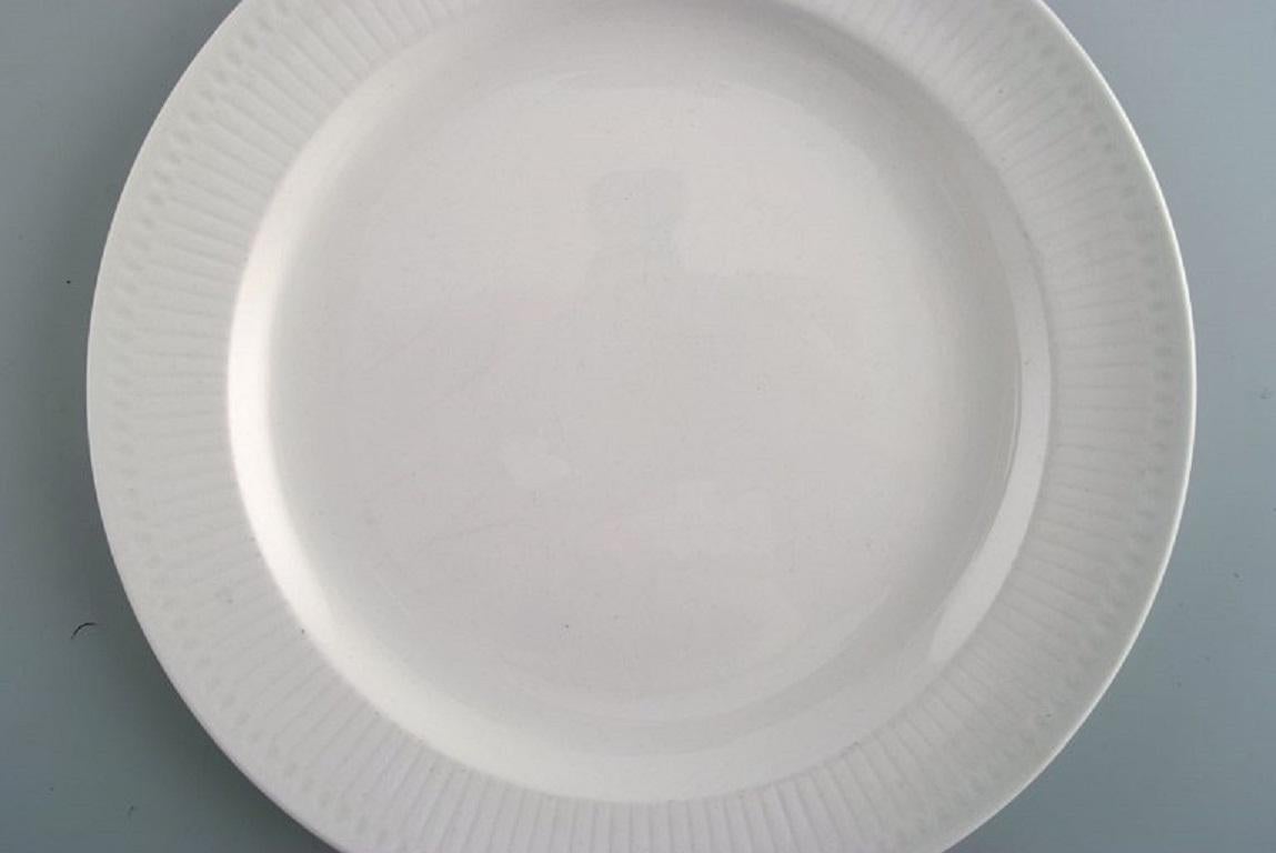 Scandinave moderne Sept assiettes en porcelaine Rrstrand, grce sudoise. Milieu du 20e sicle. en vente