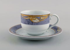 Seven Royal Copenhagen Gray Magnolia Coffee Cups with Saucers in Porcelain