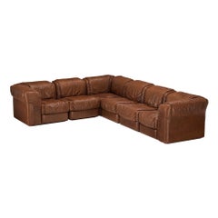 Sofá modular Seven Salotti de piel color coñac