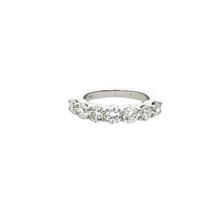 Let us introduce the most exclusive seven-stone diamond band ring, this band is designed to be worn on any occasion, the band features round white diamonds, these diamonds are set in the middle in a perfect line, every diamond is 0.30-carat weight,