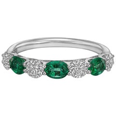 Seven-Stone Oval Emerald and Round Diamond Band