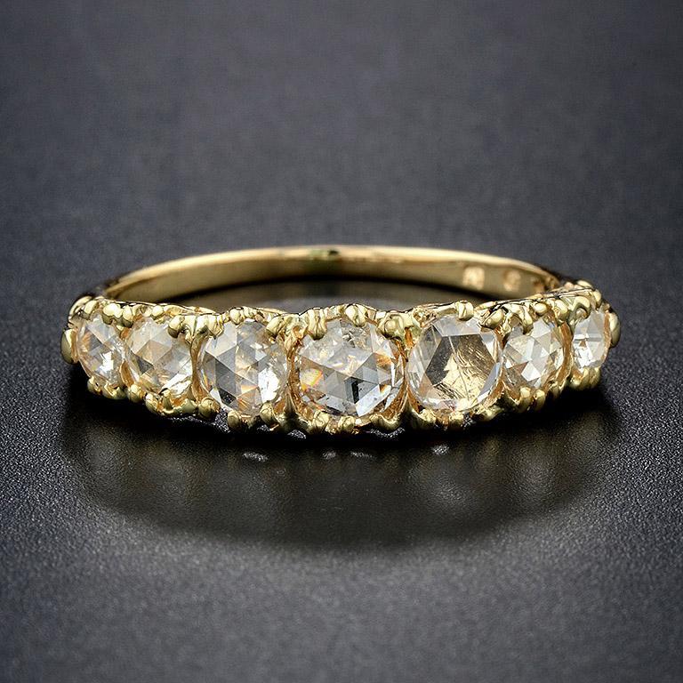 A sparkling seven stone ring from the late Victorian era. This piece features seven dazzling rose cut diamond which scintillate beautifully. This ring would make a spectacular antique engagement ring. 
Ring Information
Style: Victorian
Total weight: