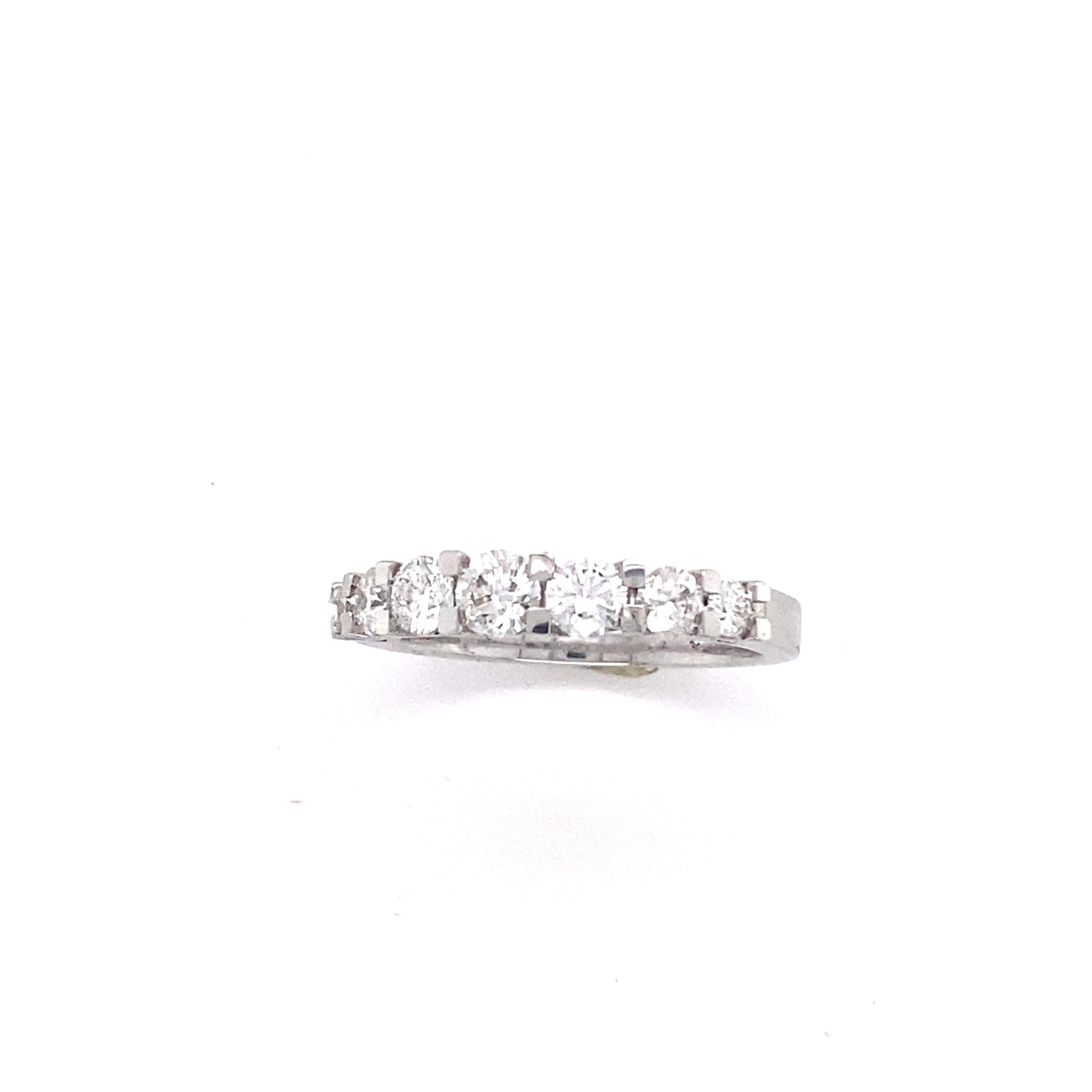 Modern Seven White Diamonds Engagement Ring