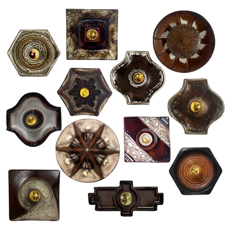 Varios apliques de cerámica vidriada en tonos marrones, 1970