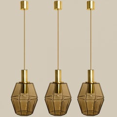 Several Geometric Brass and Glass Pendant Lights by Limburg, 1970s