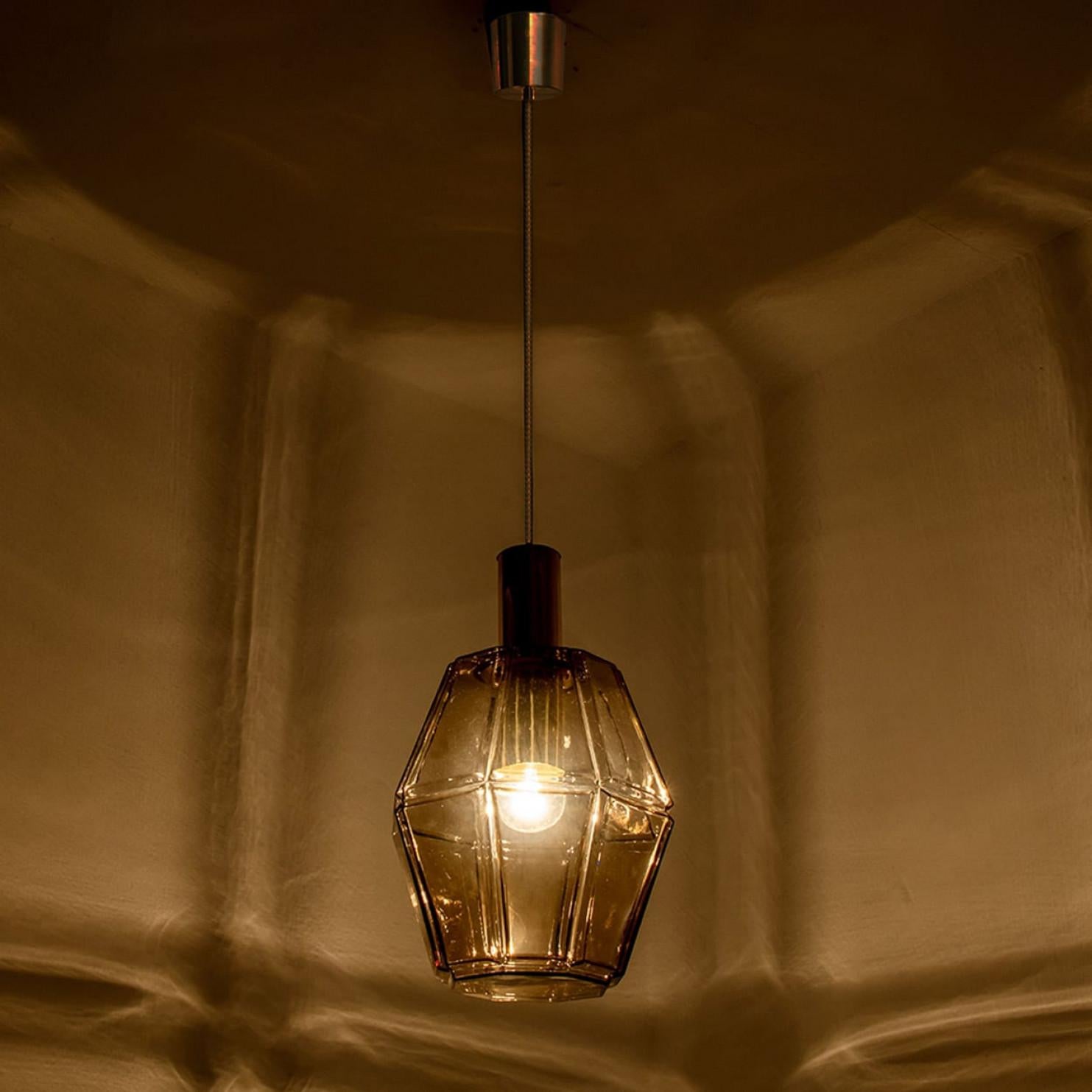 Ottone Diverse luci a sospensione geometriche in ottone e vetro di Limburg, anni '70 in vendita