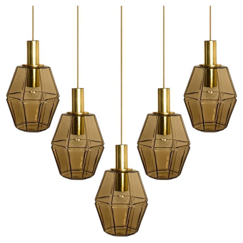 Diverse luci a sospensione geometriche in ottone e vetro di Limburg, anni
70