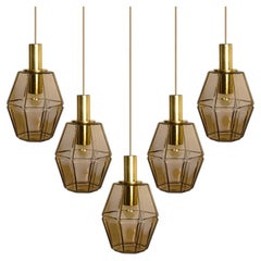Several Geometric Brass and Glass Pendant Lights by Limburg, 1970s