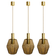Several Geometric Brass and Glass Pendant Lights by Limburg, 1970s