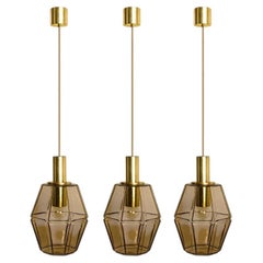 Several Geometric Brass and Glass Pendant Lights by Limburg, 1970s
