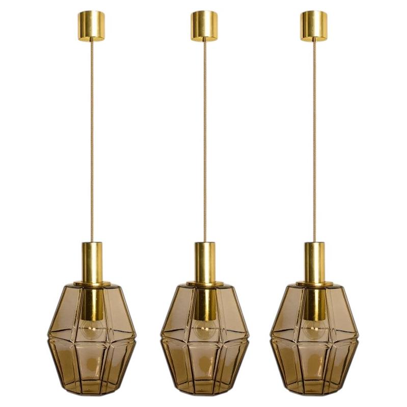 Several Geometric Brass and Glass Pendant Lights by Limburg, 1970s