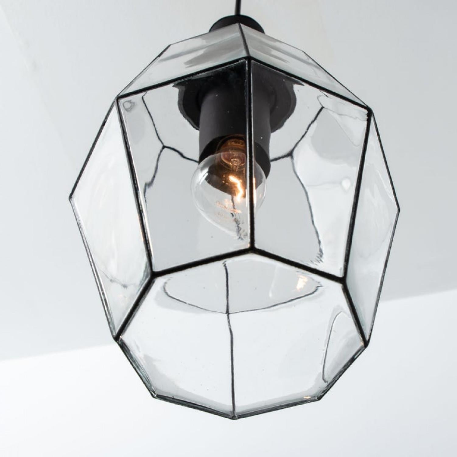 Metallo Diversi lampadari geometrici in ferro e vetro trasparente di Limburg in vendita