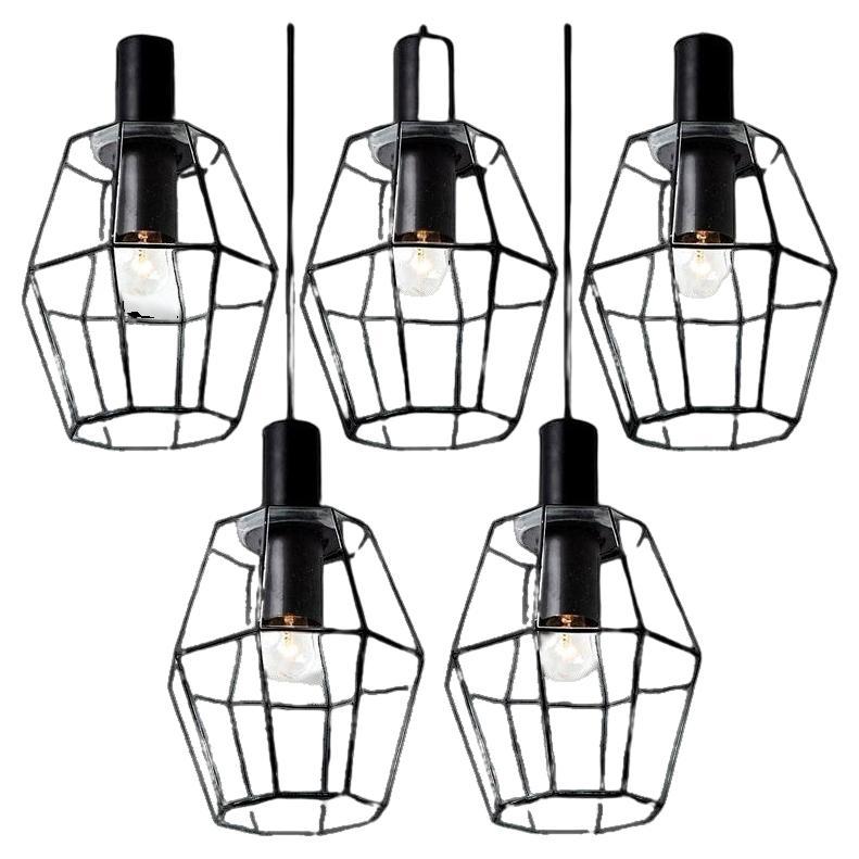 Diversi lampadari geometrici in ferro e vetro trasparente di Limburg