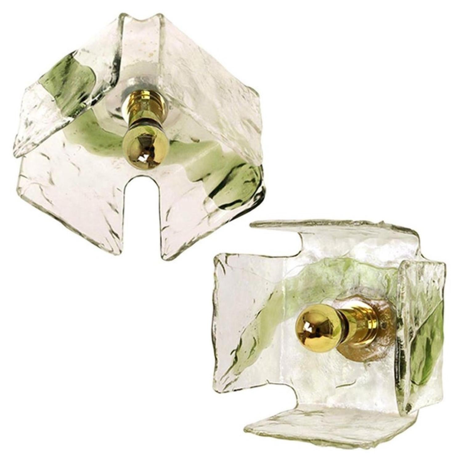 This glass wall sconces or ceiling lights executed in hand blown green and clear Murano glass and chrome hardware are produced by J.T. Kalmar, Austria, in the 1960s. Illuminates beautifully.

Please notice the price is per item. We have more pieces