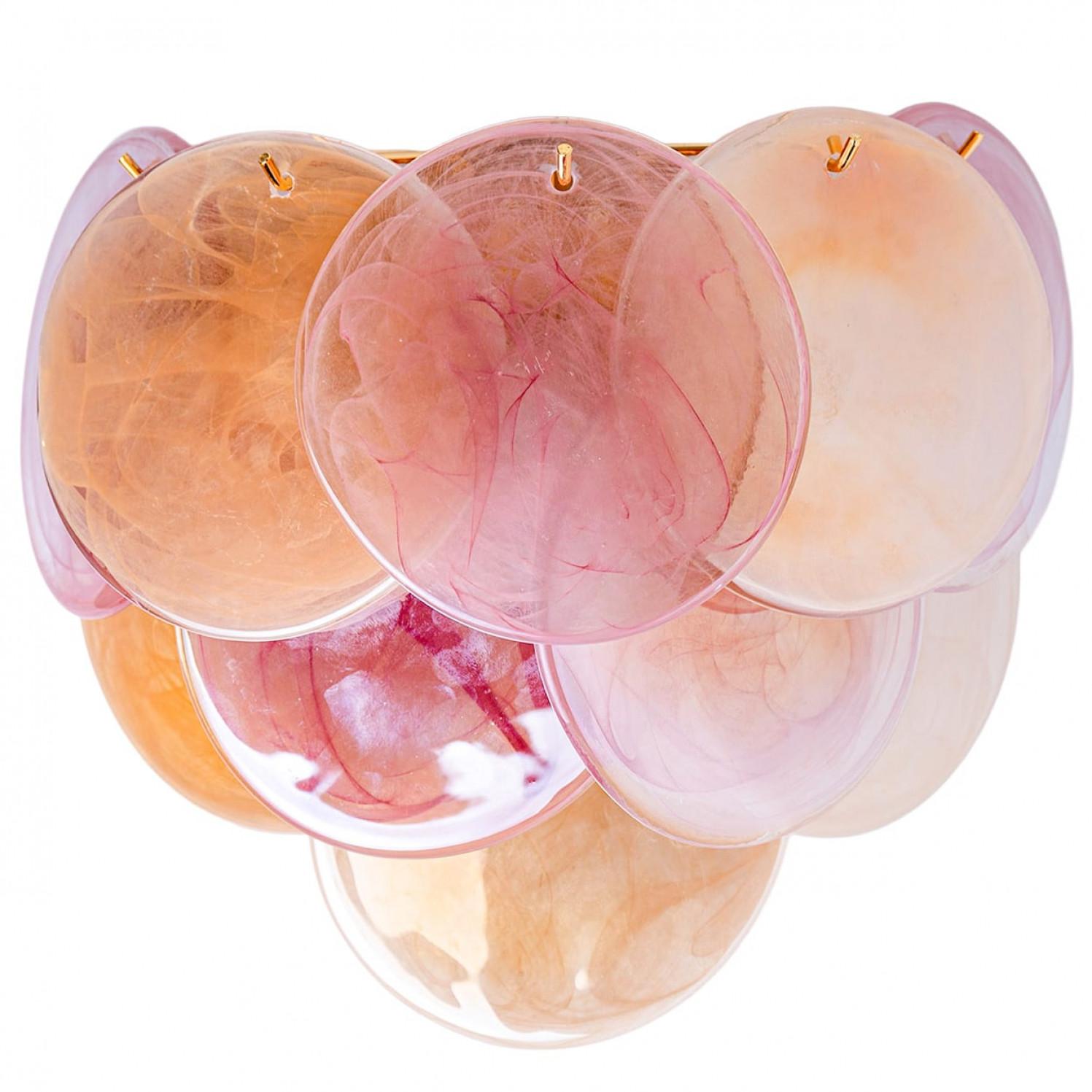 Beautiful Large Murano wall light with 10 pink and orange glass discs, with three layers of round facet chapped glass discs with brass frame.

In very good vintage condition. Well wired, perfectly cleaned and ready for use. This wall light requires