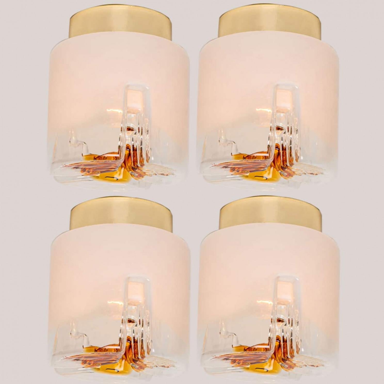 Several great Mid-Century Modern abstract wall sconces by Mazzega Murano. An Italian design from the 1970s. Mazzega is one of the famous manufacturer of Murano like Venini, Vistosi, Seguso or Carlo Nason, Tuny Zuccheri.

Truly a beautiful pair of