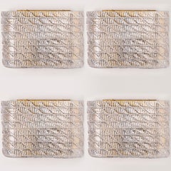 Varios apliques de pared de cristal acanalado de diseño orgánico, Italia