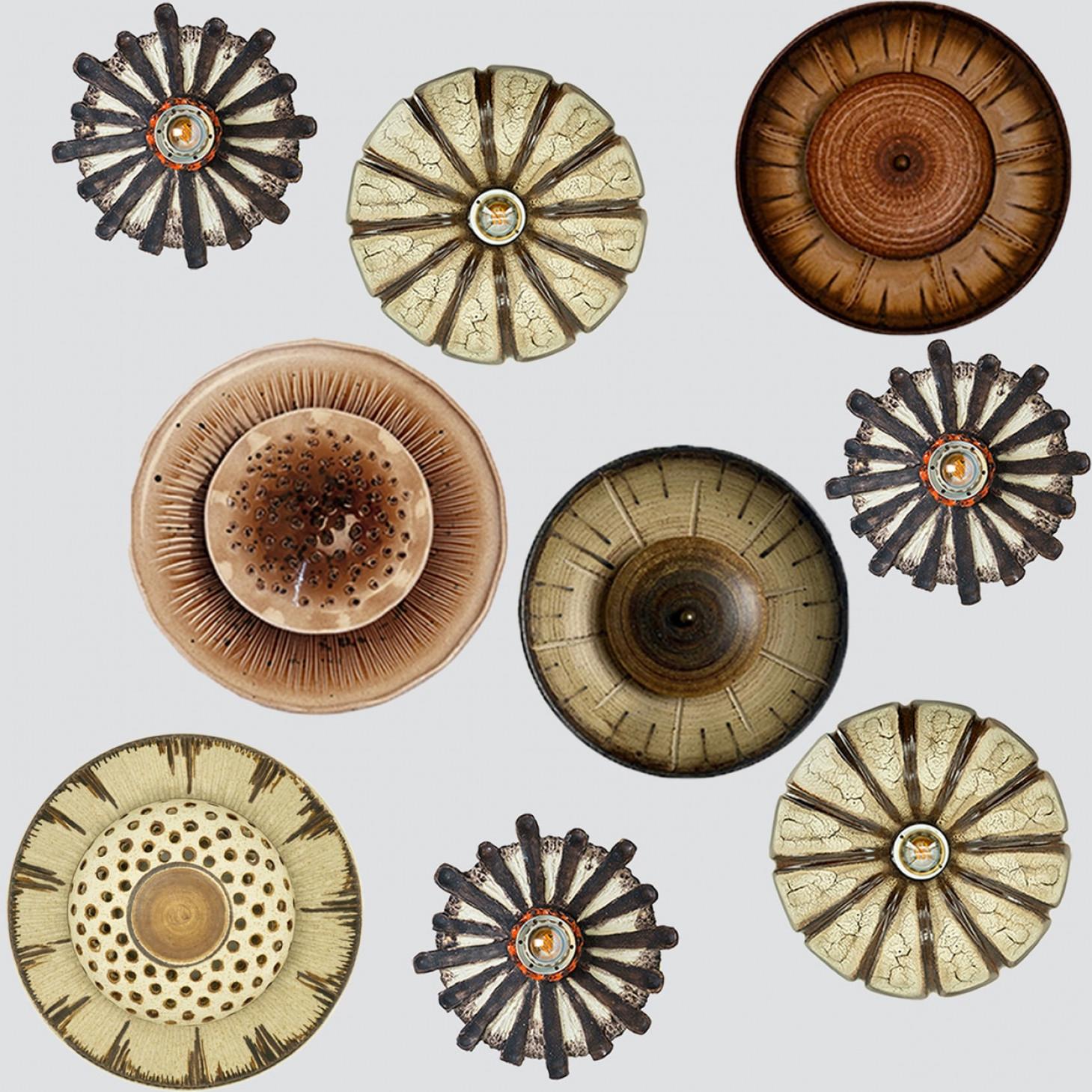 Spectacular circular ceramic wall light, with beautiful accents. Manufactured in Denmark in the 1970s. Some o fthem are Labelled and signed by Lovemose some are unsigned. In excellent condition.

Cleaned, well-wired and ready to use.

Please notice
