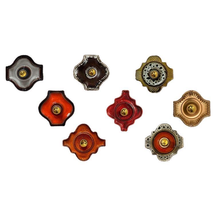 Diverse luci da parete in ceramica smaltata in stile misto, 1970