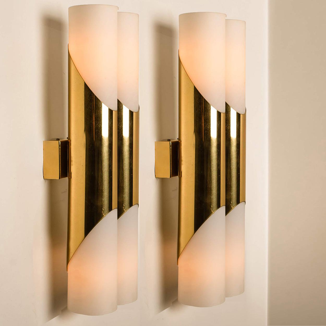 Set stunning sconces designed in the style of RAAK. Minimalistic design executed with a taste for excellence in craftsmanship.
Good condition that means this piece is not new but in a very good vintage condition with some beautiful minor signs of