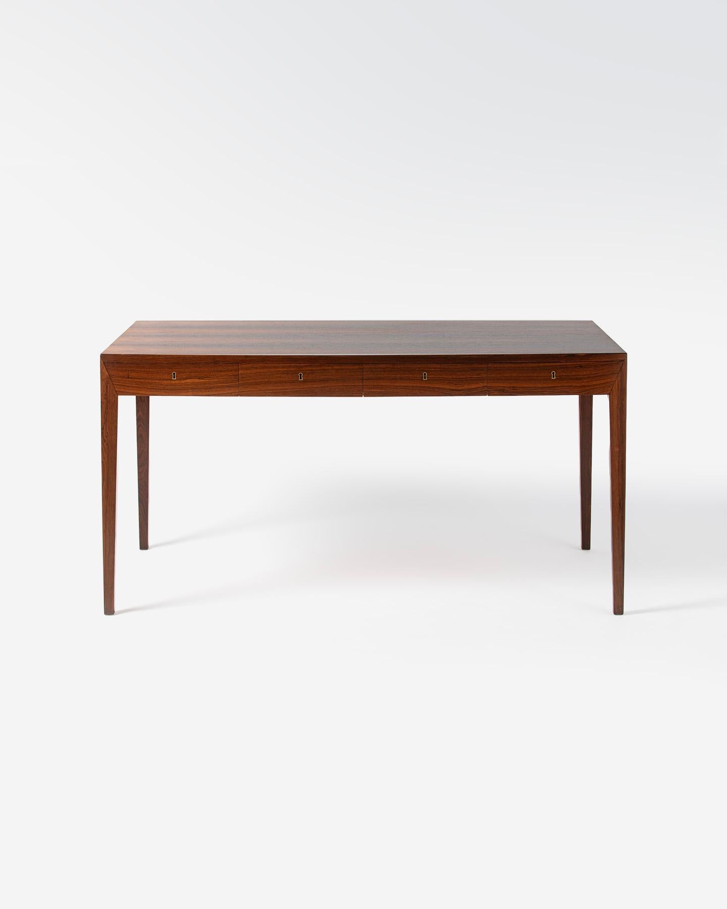Severin Hansen - Model 36 Desk, 1958

An original example of the highly collectible and sought-after Model 36 desk produced by Haslev Mobelsnedkeri in Denmark and designed by Danish master Severin Hansen Jnr. in 1958. This iconic design features
