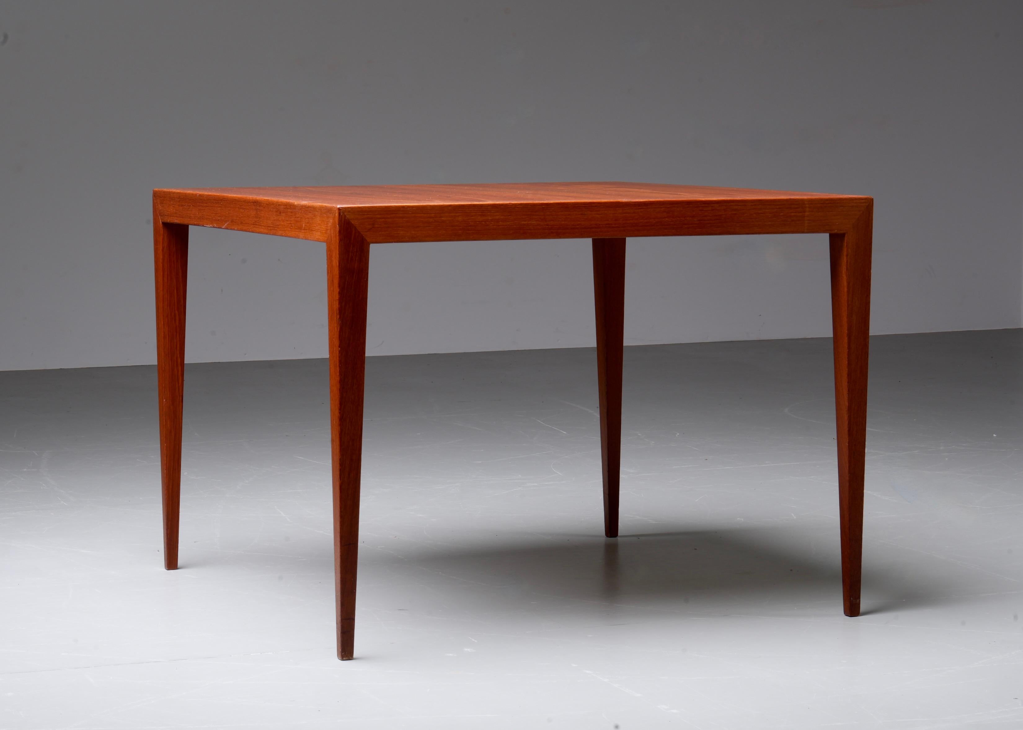 This coffee table, designed by Severin Hansen in Denmark in the 1970s, is made of beautiful teak wood. The clean, minimalist design highlights the Danish mid-century modern style, with elegant and slender tapered legs. The table’s surface shows the