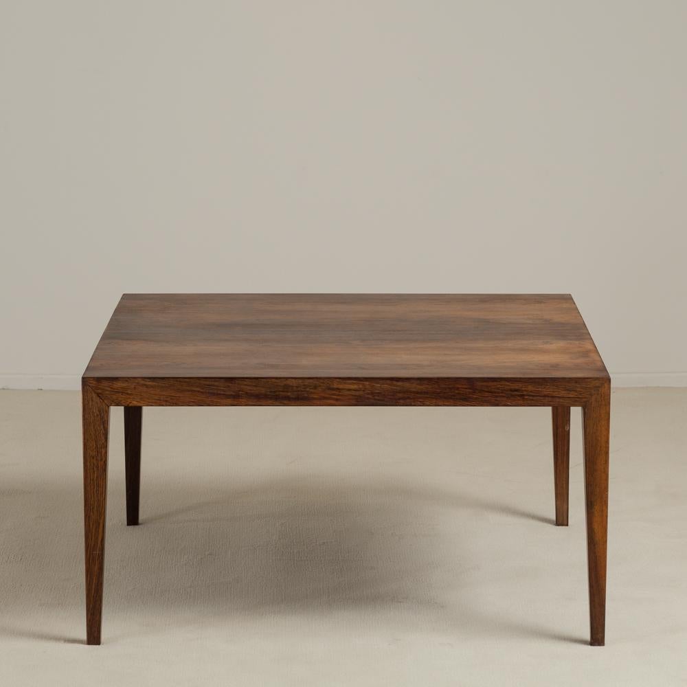 A Severin Hansen designed rosewood coffee table on tapered legs made by cabinetmaker Haslev Mobelsnedkeri, circa 1955.

 