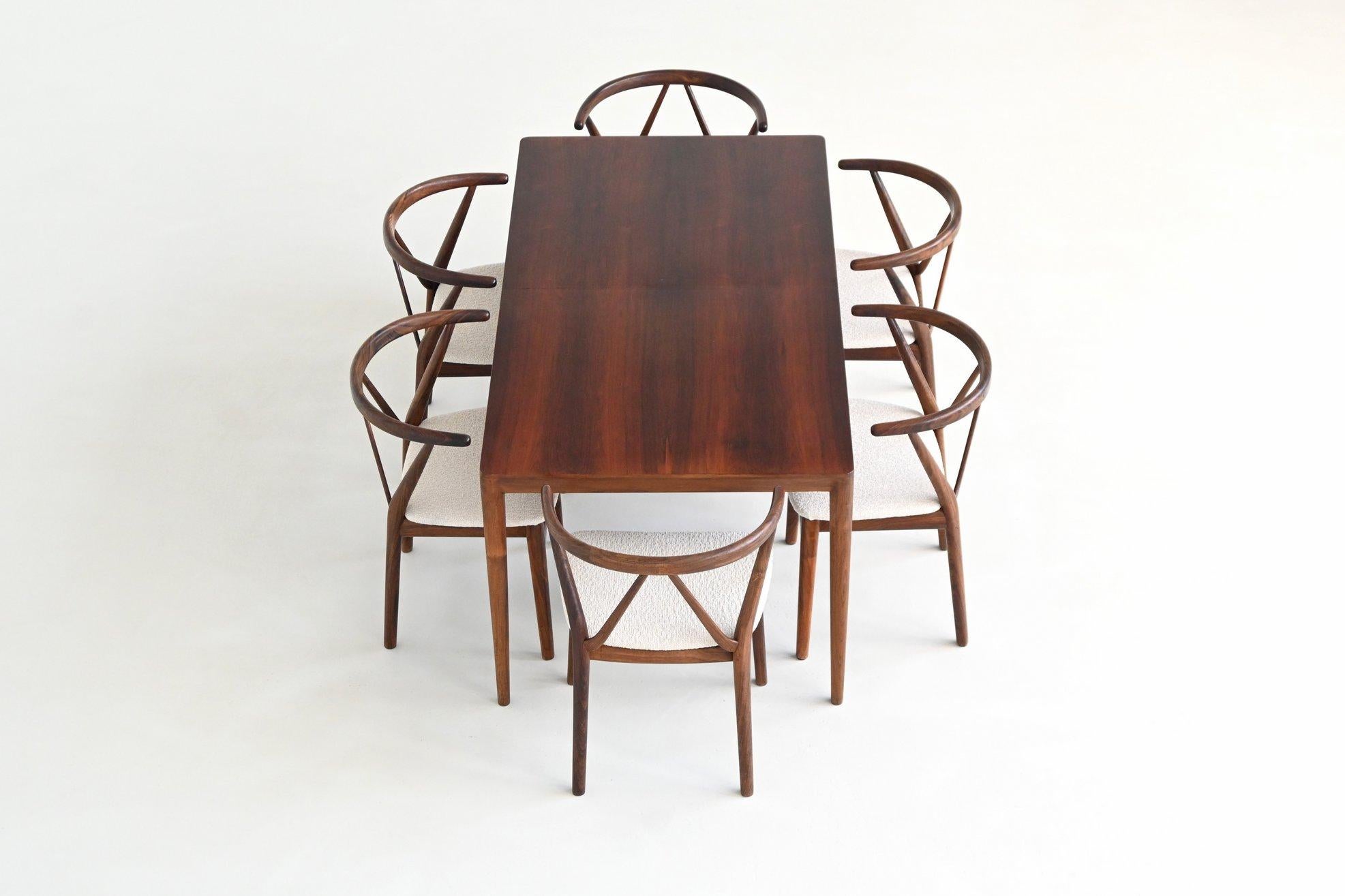 Elegant extendable dining table designed by Severin Hansen for Haslev Møbelsnedkeri, Denmark 1960. This table is a quintessential example of Danish modernism. Crafted from richly grained rosewood, the table features Hansen’s hallmark design