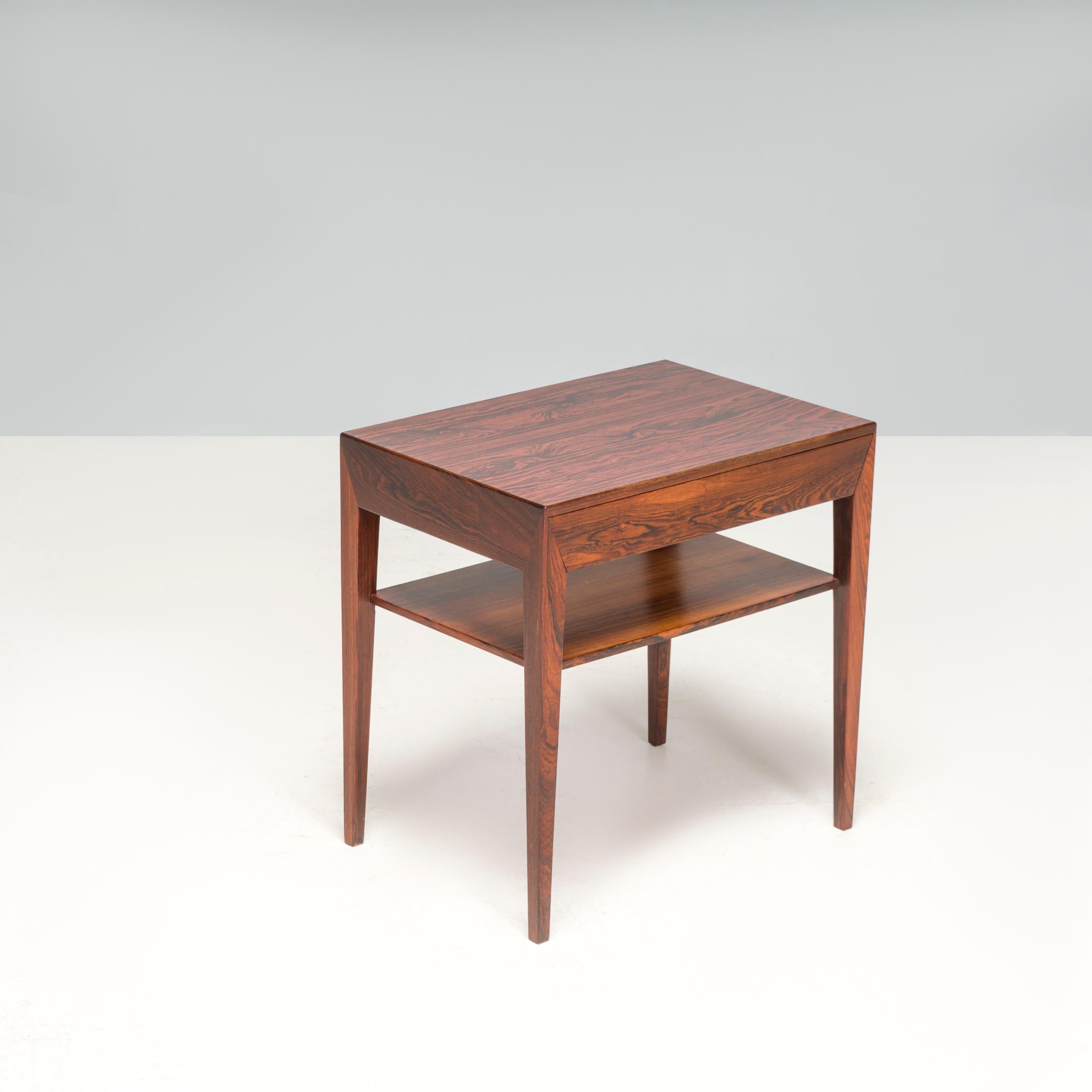 Highly figured rosewood bedside table with a single, oak-lined drawer and a shelf beneath. Produced by Haslev Mobelsnedkeri, Denmark c1960s. 
It can be used as a nightstand, bedside table or side table designed by Severin Hansen for Haslev