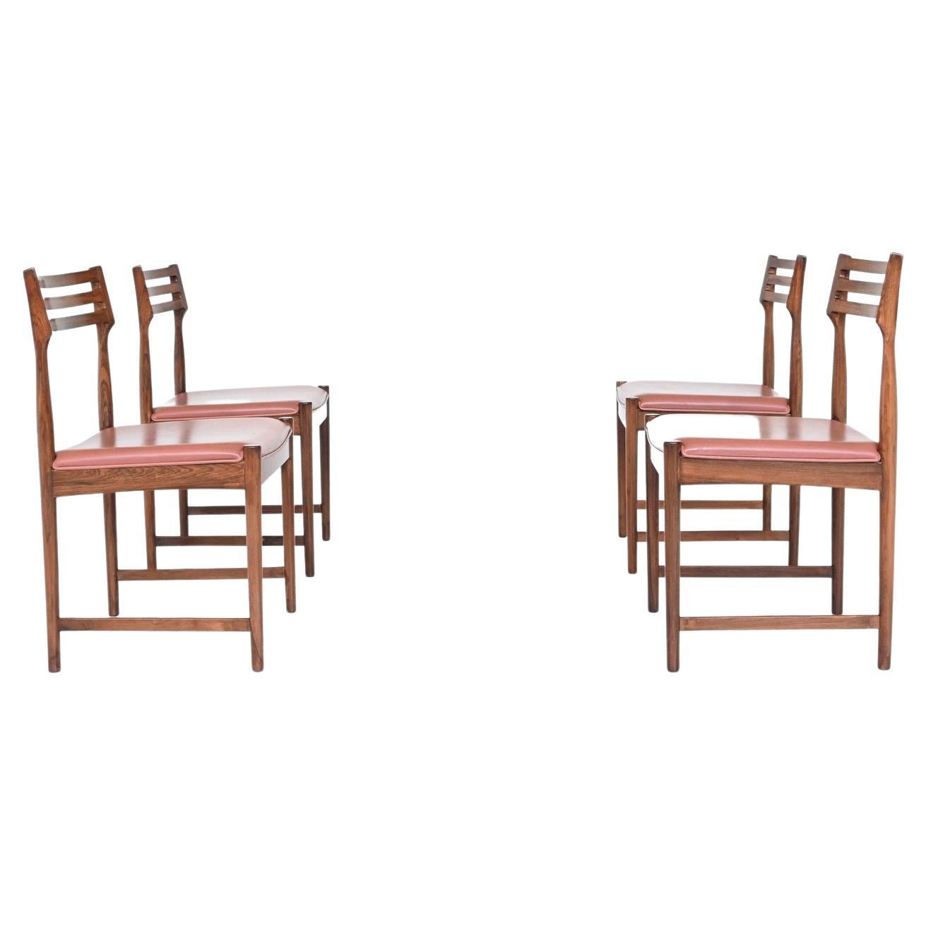 Beautiful set of four dining chairs designed by Danish designer Severin Hansen for Dutch manufacturer Bovenkamp, Denmark 1960. These well-crafted chairs are made of nicely grained solid rosewood and the seats are upholstered with original brown
