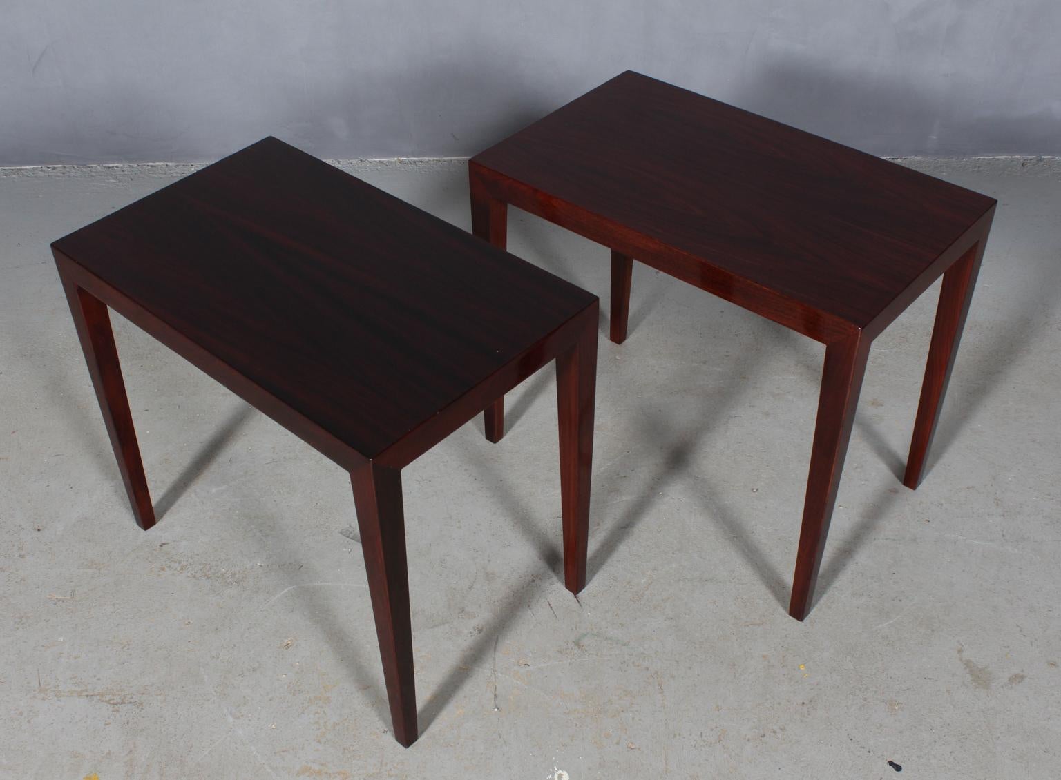 Severin Hansen set of side tables / bed side tables.

Rosewood veneer.

Made by Haslev Møbler, 1960s.