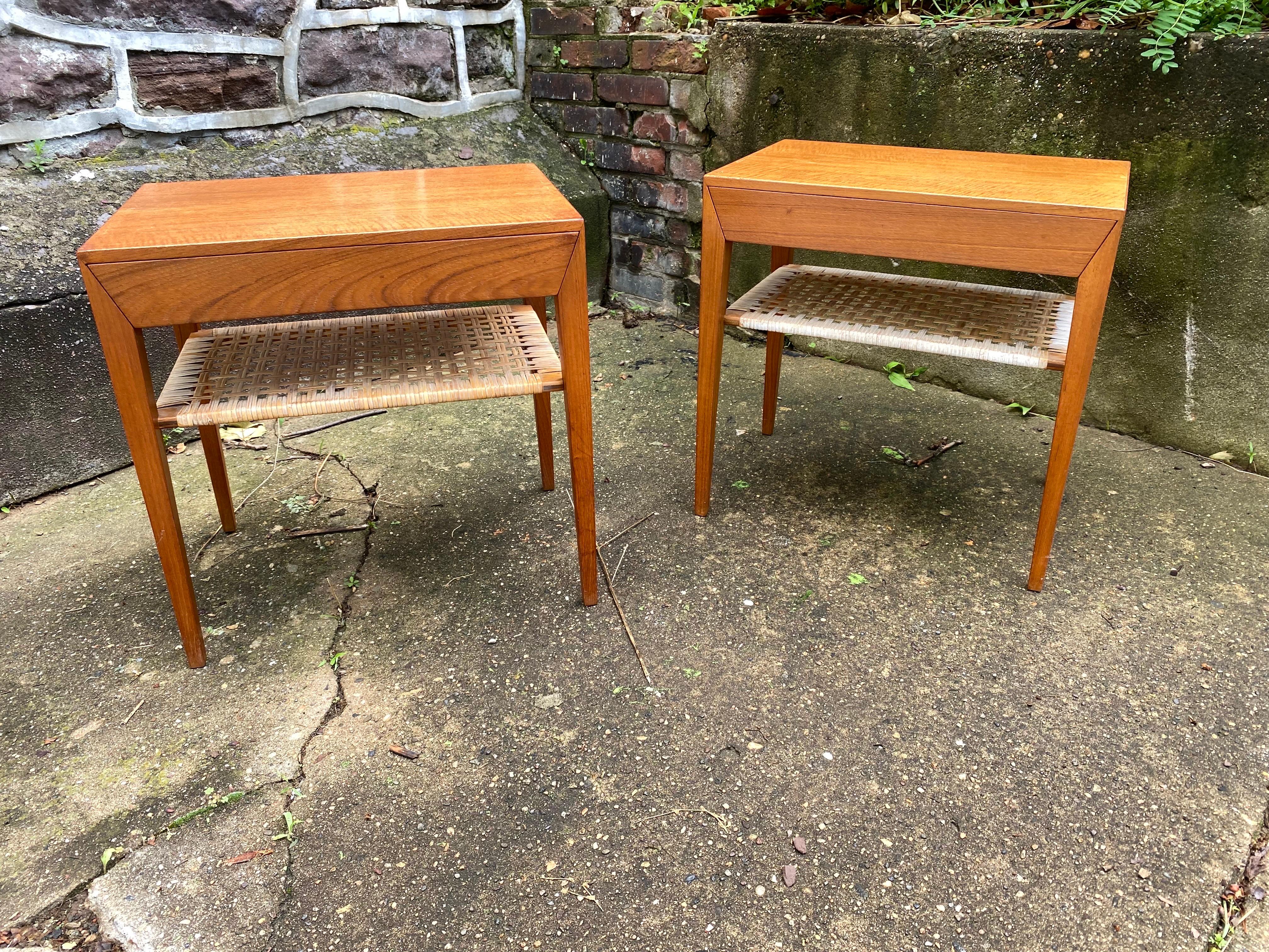 Severin Hansen Pair of Teak Night Tables with Caned shelfs. Very nice condition, tops have been refinished and tables cleaned and oiled. Caning in very good shape with no rips or breaks. Hansen designed an entire series of desks and tables with the