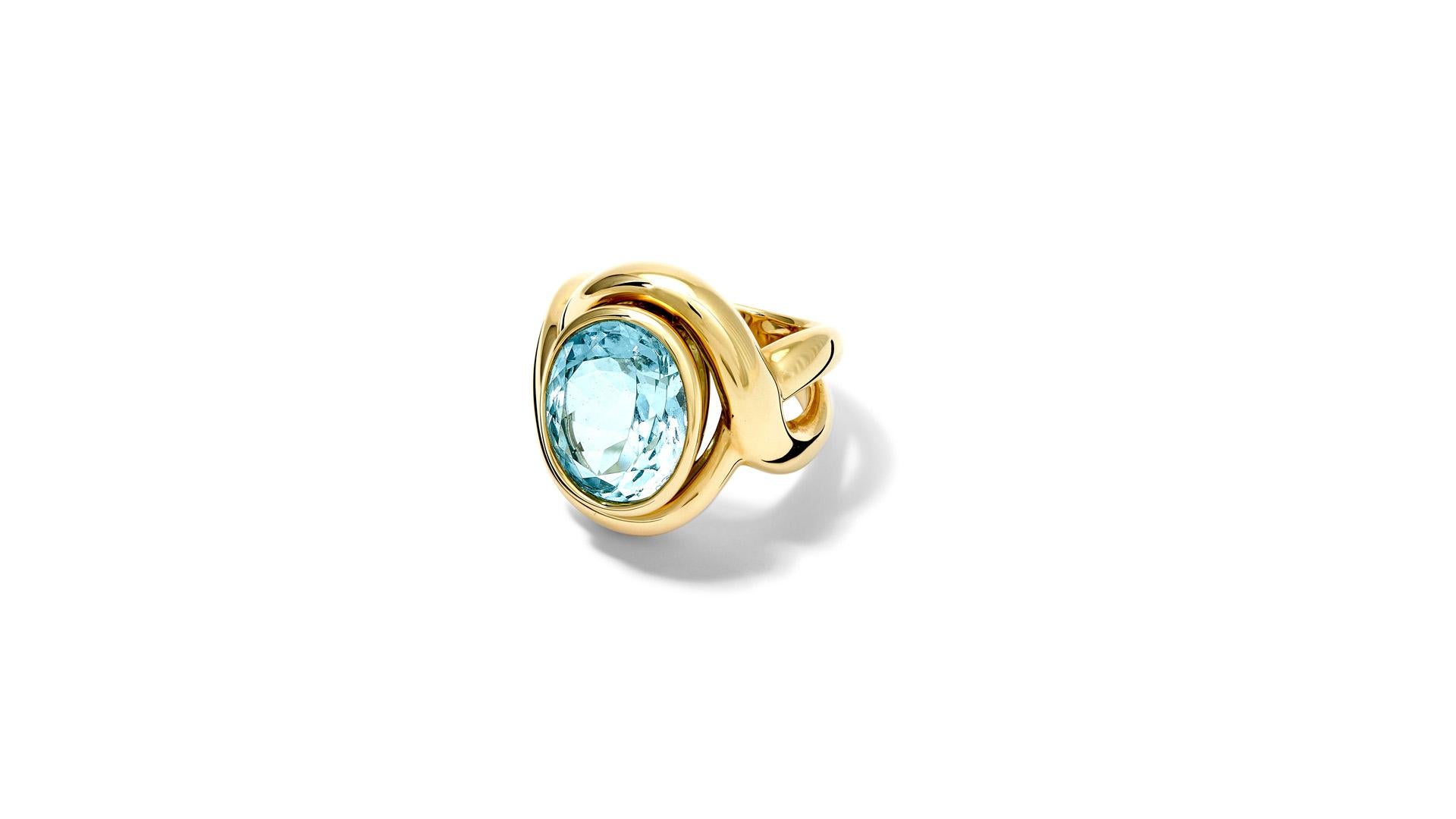 Severine 18 carat yellow gold ring set with an oval cut facetted soft blue aquamarine. The stone set vertically. From the Journey to Scandinavia.

This ring is a finger size 54, however can be resized. Please contact us for more information about