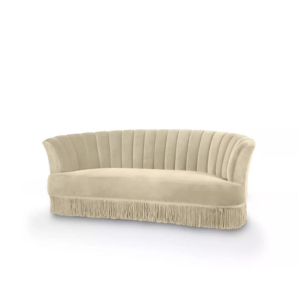 Inspired by wild, passionate nights of the Spanish dance, the Sevilliana sofa design embodies the graceful curves and attire of Sevillana dancing girls. Become entranced in the movement of modern lines drawing your eye down to the flirtatious fringe