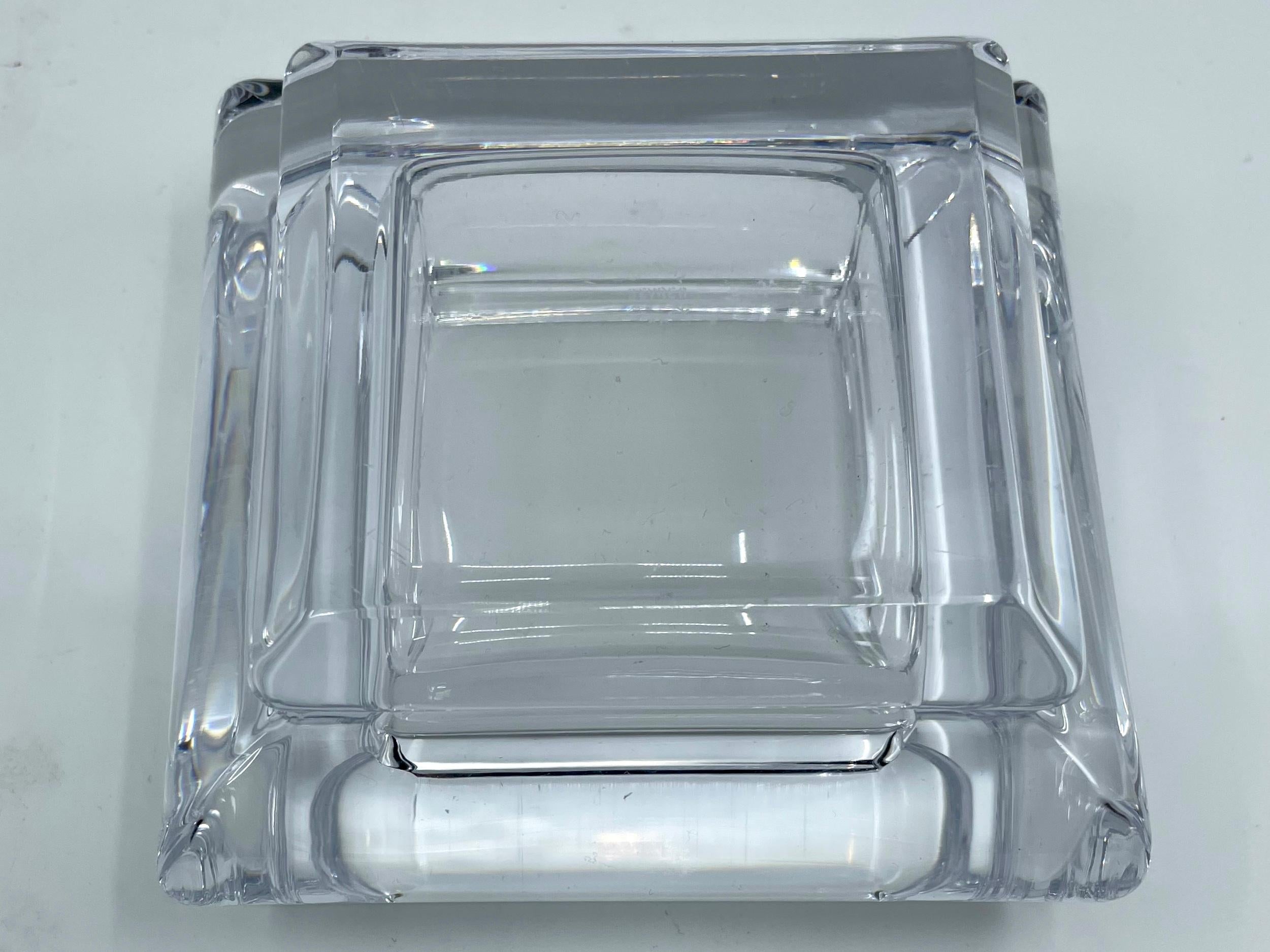 Sevres chunky crystal ashtray. Large heavy thick cushion carved Sevres crystal ashtray / vide poche with markings for Sevres crystal at base. France, Mid-20th Century. 
Dimensions: 5.25